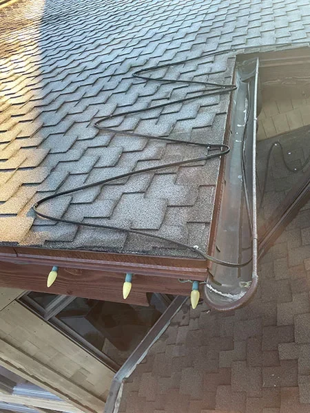 Gutter with heat cable installed to prevent ice dams on a Salt Lake City home